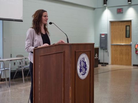Maggie McKinley at the podium, photo 12 of 17